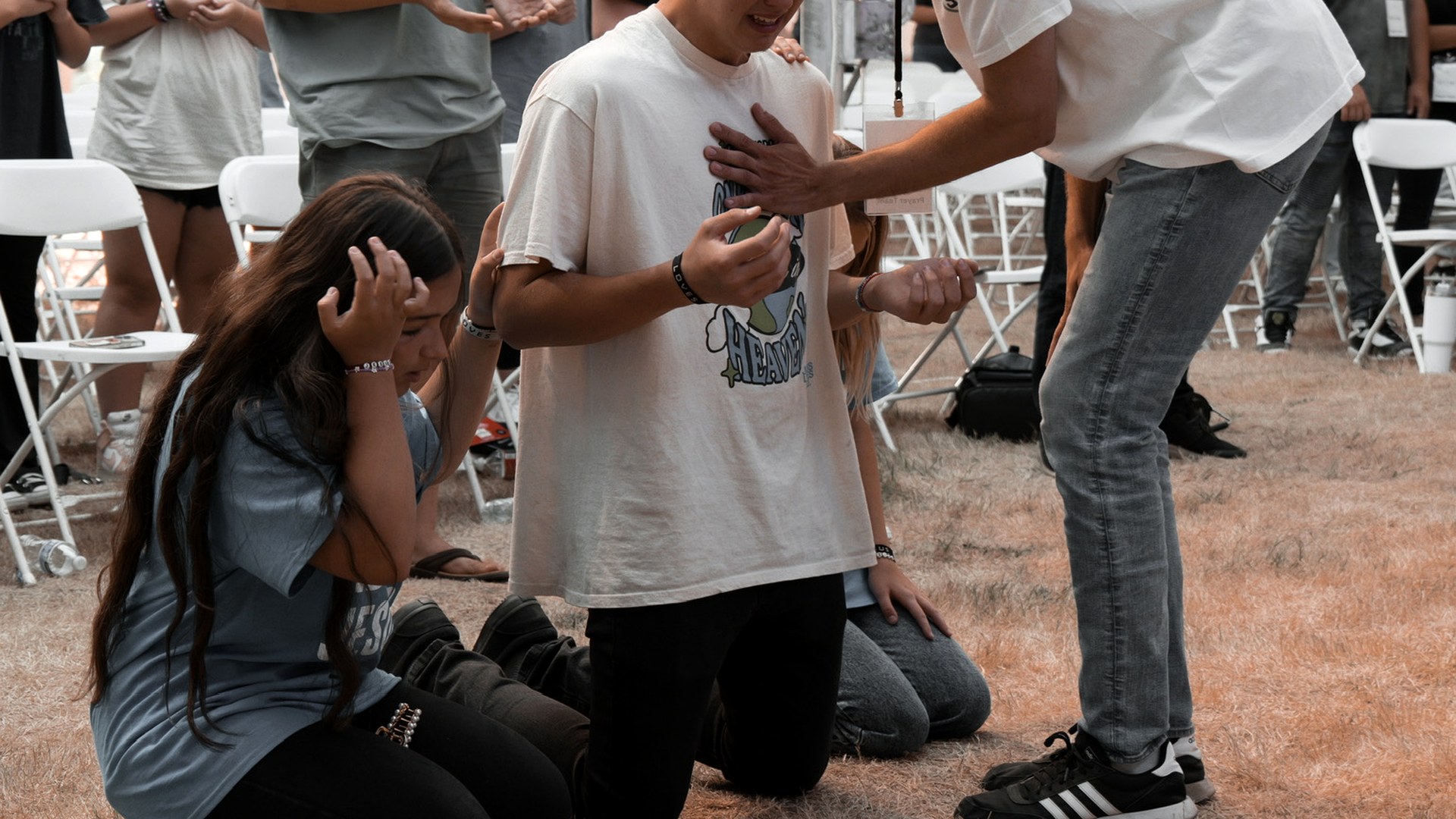 Altar prayer and healing ministry under the tent